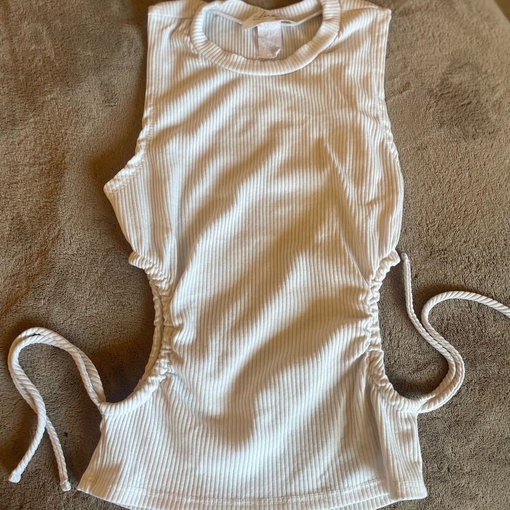 Super cute Top with cut out sides